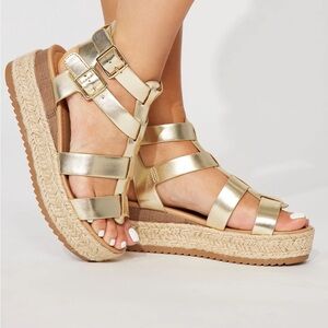 Gold gladiator wedges